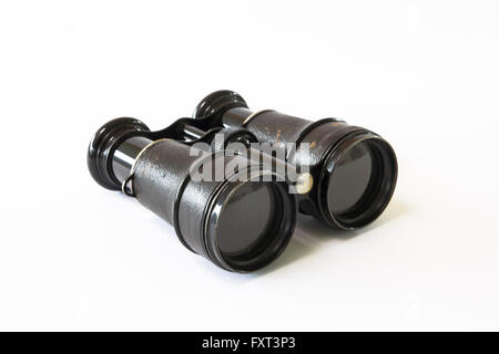 Kleines Fernglas liegend auf einer weißen Fläche Stockfoto