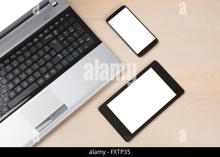 Mehrere Geräte auf Holztisch Stockfoto