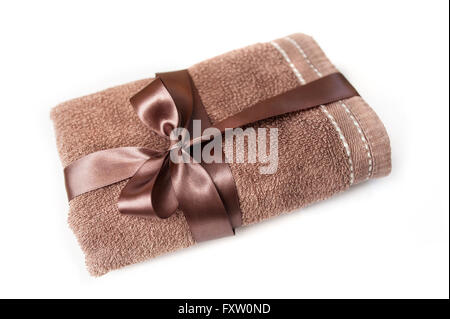 Braun Handtuch mit einem Band und Schleife gebunden Stockfoto