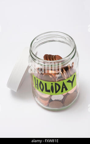 Urlaub Geld in Glas Glas auf weißem Hintergrund Stockfoto