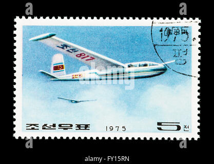 Briefmarke aus Nordkorea mit einem Segelflugzeug. Stockfoto