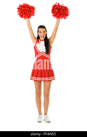 Süße Frau wie eine amerikanische Sportarten Cheerleader in roten und weißen Outfit.  Isoliert auf weißem Hintergrund. Stockfoto