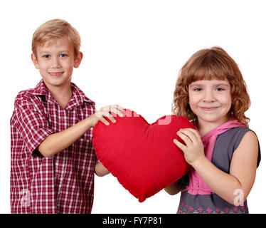 jungen und Mädchen mit großen roten Herz Stockfoto