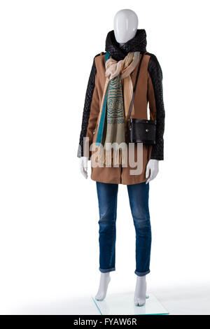 Braune Jacke und schwarze Tasche. Stockfoto