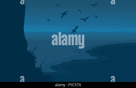 Silhouette von Strand und Vögel Stock Vektor