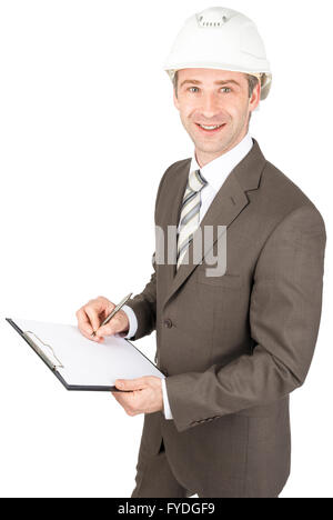 Mann-Architekt in Helm auf Dokument schreiben Stockfoto