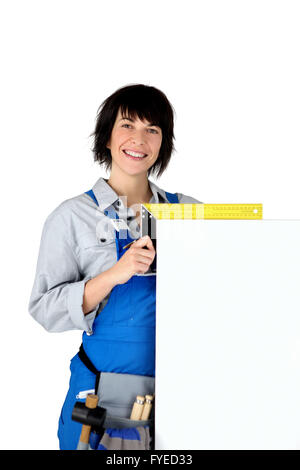 Frau Zimmermann mit einem Brett leer für Ihre Kopie Stockfoto