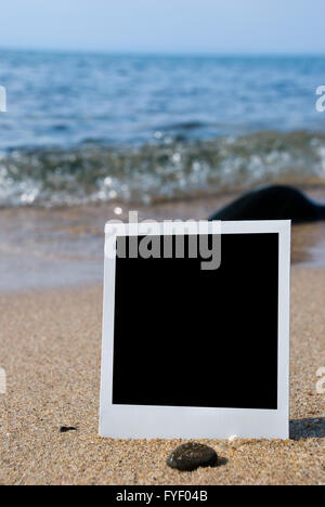 Fotokarte am Sandstrand Stockfoto