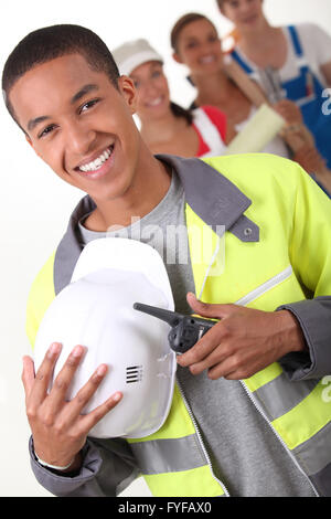 Vier junge Leute zur Veranschaulichung verschiedener Berufe Stockfoto