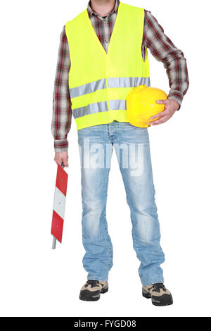 Generator stehen harte Hut in der hand tragen Sicherheitsweste Stockfoto