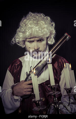 Duell, Mann des neunzehnten Jahrhunderts, Kronleuchter mit Kerzen Stockfoto