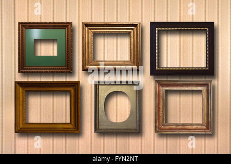 Vergoldeter Holzrahmen für Bilder im Hintergrund Stockfoto