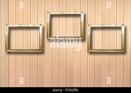 Vergoldeter Holzrahmen für Bilder im Hintergrund Stockfoto