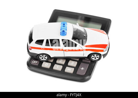 Rechner und Spielzeug Polizeiauto Stockfoto