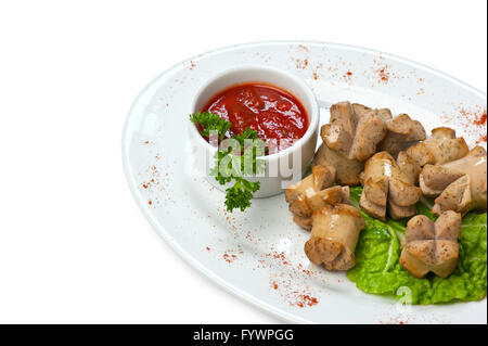 gehackte Würste gebraten mit Gemüse und Gewürzen Stockfoto