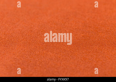 Orange Stoff Textur oder Hintergrund Stockfoto