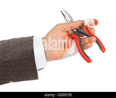 Hand mit Werkzeug und bandage Stockfoto