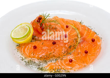 Lachs-Carpaccio mit rosa Pfeffer Stockfoto