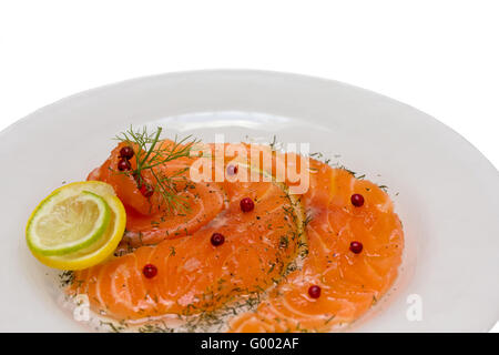 Lachs-Carpaccio mit rosa Pfeffer Stockfoto