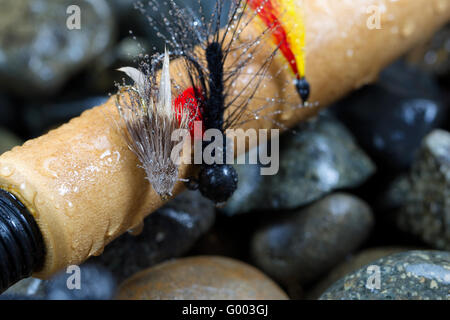 Fischen fliegen auf Korkgriff Stockfoto