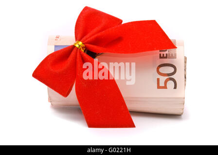Rolle des Euro Geld und roter Schleife isoliert auf weißem Hintergrund Stockfoto