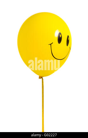 Gelber Ballon mit Lächeln auf weißem Hintergrund Stockfoto