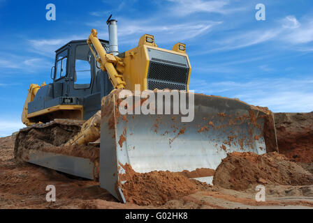 Nahaufnahme der schweren Bulldozer stehen im Sandkasten Stockfoto