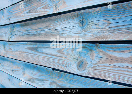 Holz-Hintergrund. Fragment einer alten Mauer aus Holz mit Knoten Stockfoto