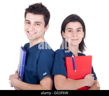 freundliches Team von Ärzten halten Ordner isoliert auf weißem Hintergrund (Rücken an Rücken) Stockfoto