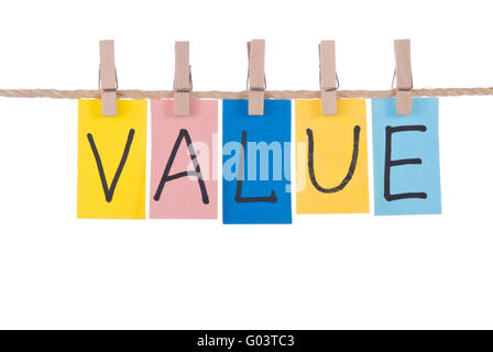 Wert, Seil hängen bunte Wörter durch Holzpflock Stockfoto