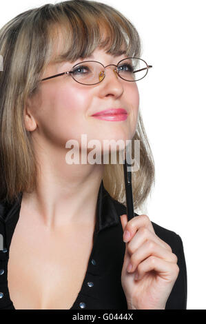 Die Geschäftsfrau in Brillen und mit Stift Stockfoto