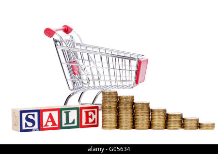 Münzen in Form von Diagramm, shopping Cart und Wort Verkauf Stockfoto