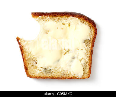 Butter auf geschnittene gesunde Korn Brot streichen isoliert auf weißem Hintergrund, Ansicht von oben Stockfoto