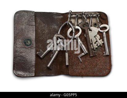 Die alten Schlüssel in alten Schlüssel, Brieftasche isoliert Stockfoto