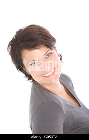 Ziemlich lächelnde Frau blickte in die Kamera Stockfoto