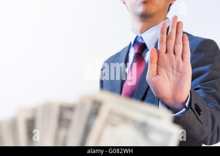 Geschäftsmann weigert sich, Geld - erhalten keine Bestechung und Korruption Konzept Stockfoto