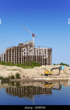 Arbeiten Sie auf einer Baustelle. Industrie-Bau Stockfoto