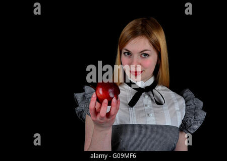 Blonde Frau mit roter Apfel Stockfoto