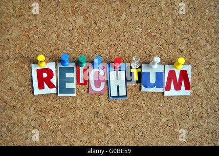 Pinboard Slogan Reichtum Stockfoto