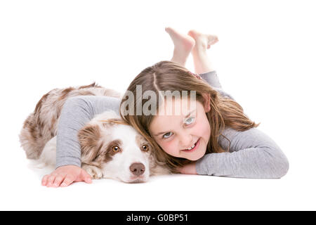 kleines Mädchen mit einem Border collie Stockfoto