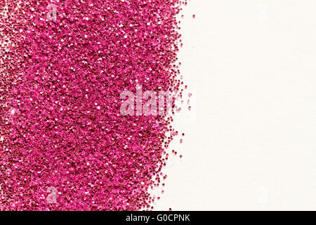 Rosa Glitzer auf hellem Hintergrund - Makrofoto Stockfoto