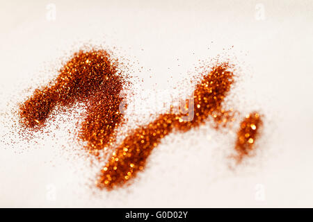 Gelbe Glitzer auf hellem Hintergrund - Makrofoto Stockfoto