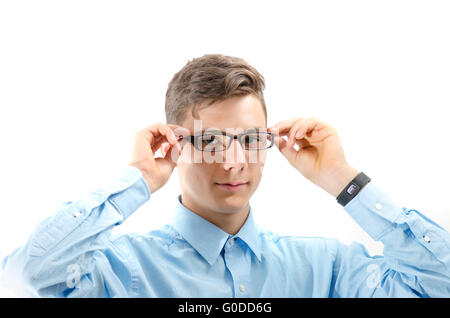 Teenager mit neuen Gläsern auf Augen, isoliert auf weiss Stockfoto