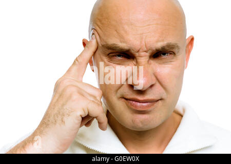 Mann mit seinem Finger an die Schläfe. Kopfschmerzen oder problem Stockfoto