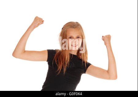 Fröhliches junges Mädchen, hob die Arme. Stockfoto