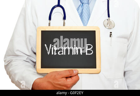 Vitamin B - Arzt mit Tafel Stockfoto