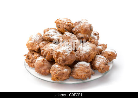 Haufen von gezuckerten frittierte Krapfen oder Oliebollen im Maßstab Stockfoto