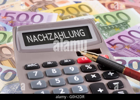 Zuzahlung auf Rechner markiert Stockfoto