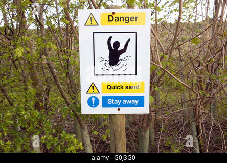 Treibsand-Warnschild Stockfoto