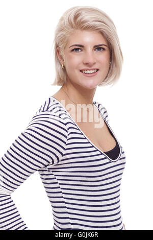 Lächelnde hübsche blonde Frau im lässigen Streifen Hemd Stockfoto